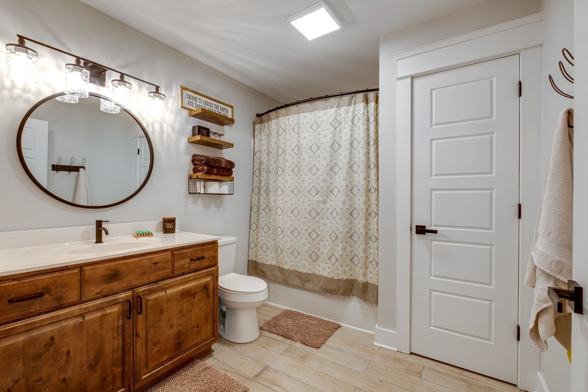 1227 Stayton Road Cumberland Furnace, TN 37051 - Photo 37 of 70 a bathroom with a double vanity sink mirror and shower