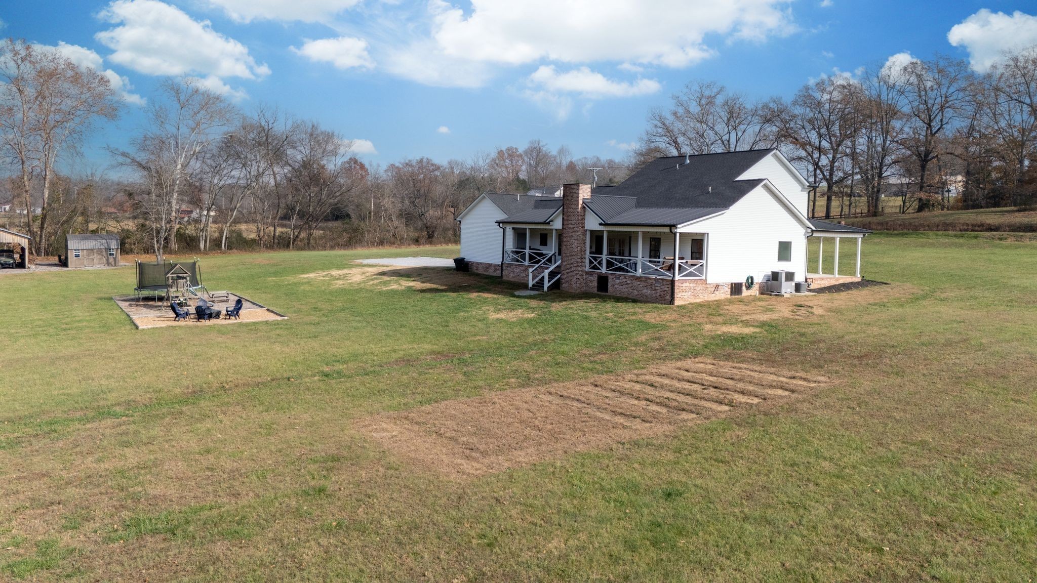 1227 Stayton Road Cumberland Furnace, TN 37051 - Photo 52 of 70 a view of a house with backyard and sitting area