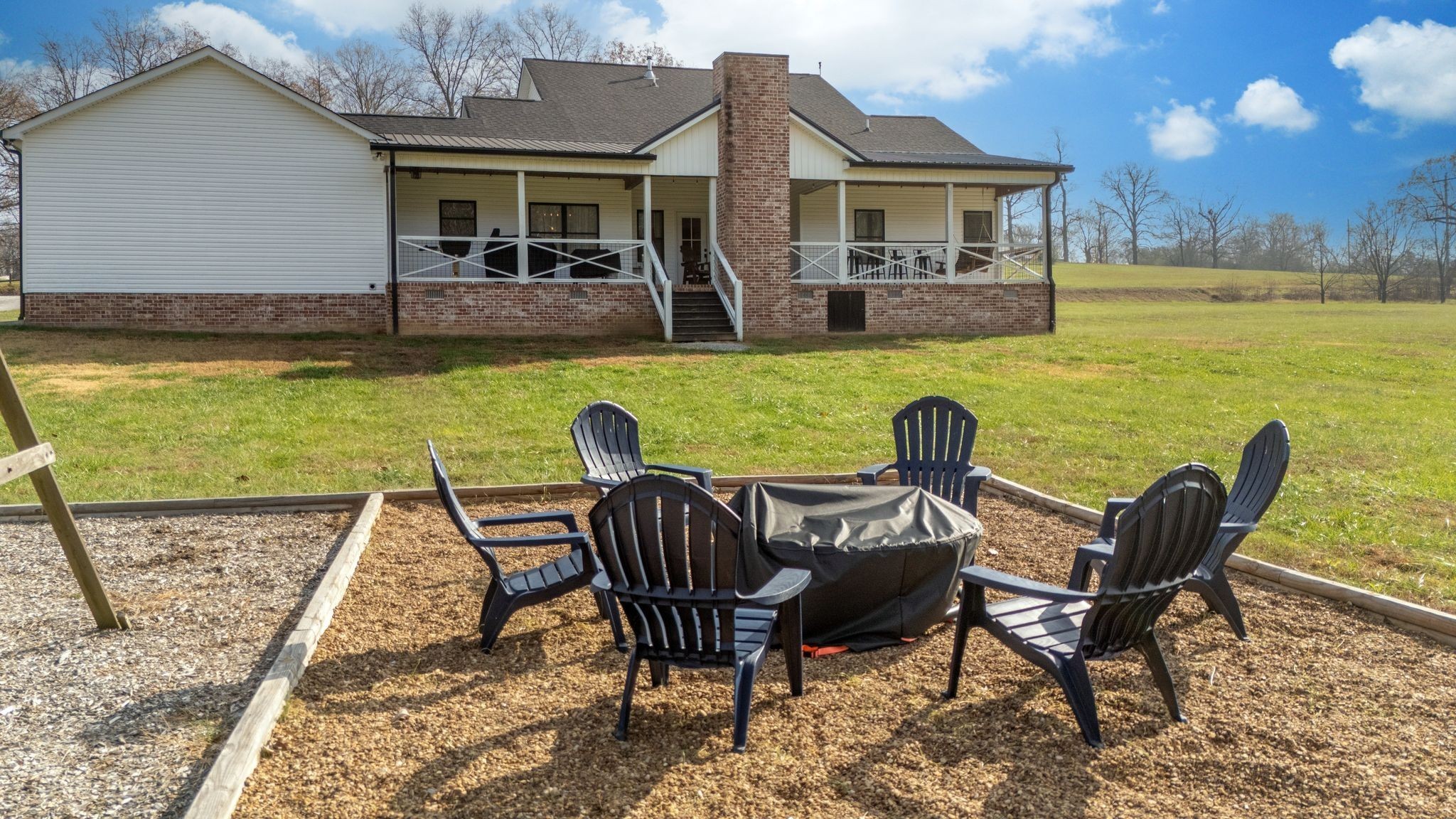1227 Stayton Road Cumberland Furnace, TN 37051 - Photo 55 of 70 a view of a house with backyard porch and patio