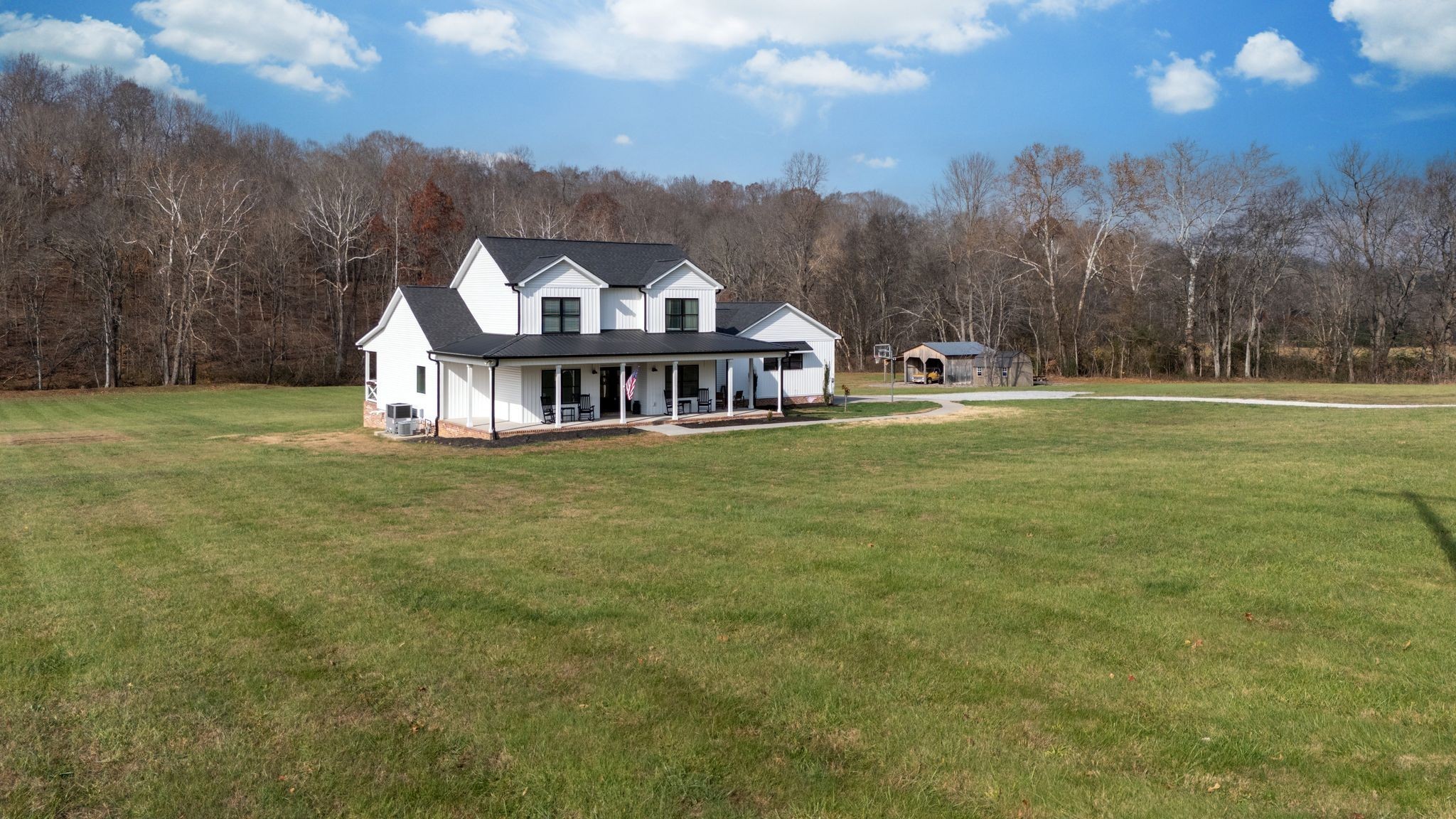 1227 Stayton Road Cumberland Furnace, TN 37051 - Photo 6 of 70 a view of a house with a big yard and a large tree