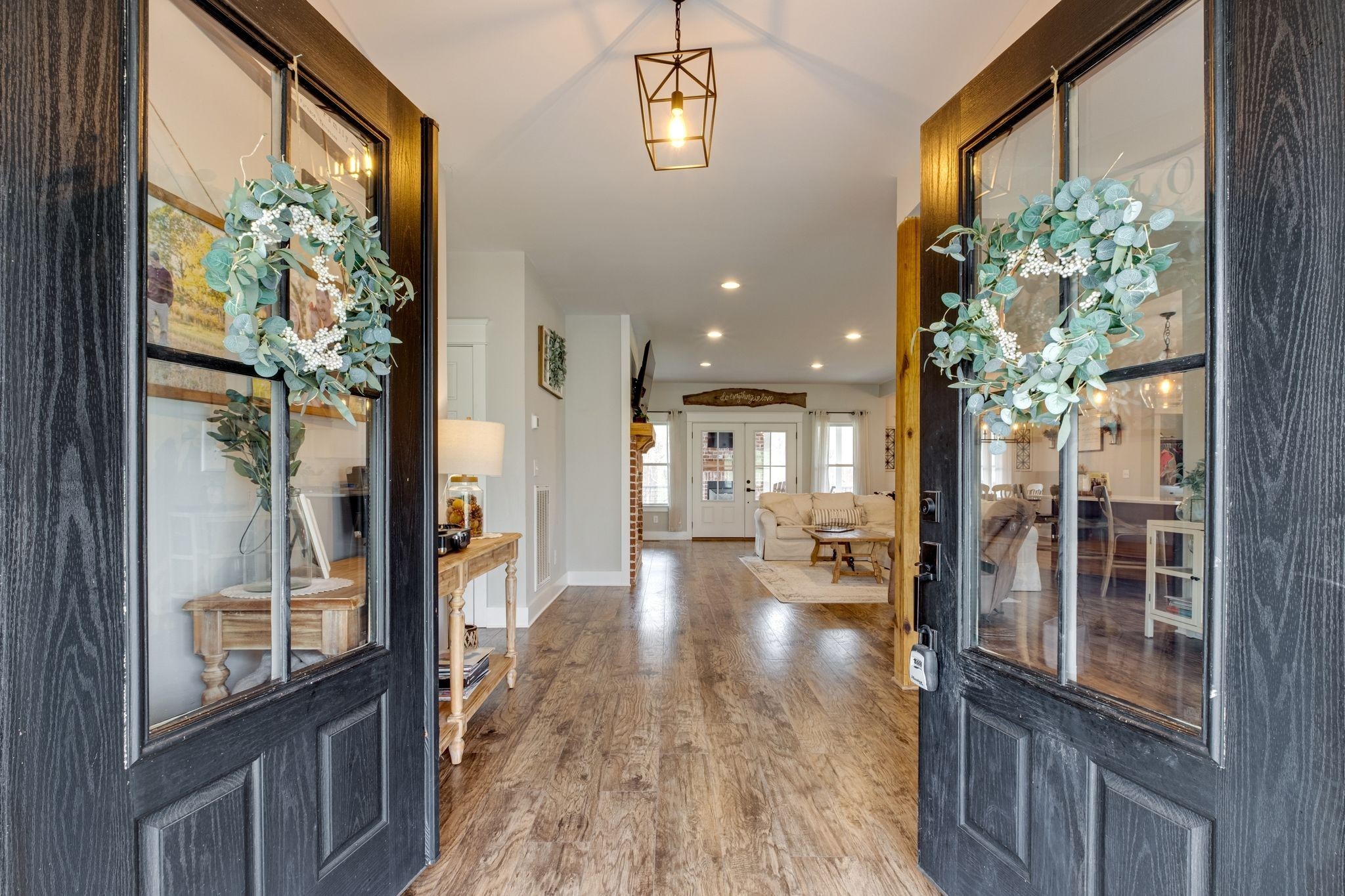 1227 Stayton Road Cumberland Furnace, TN 37051 - Photo 8 of 70 a view of a hallway with wooden floor and a dining room