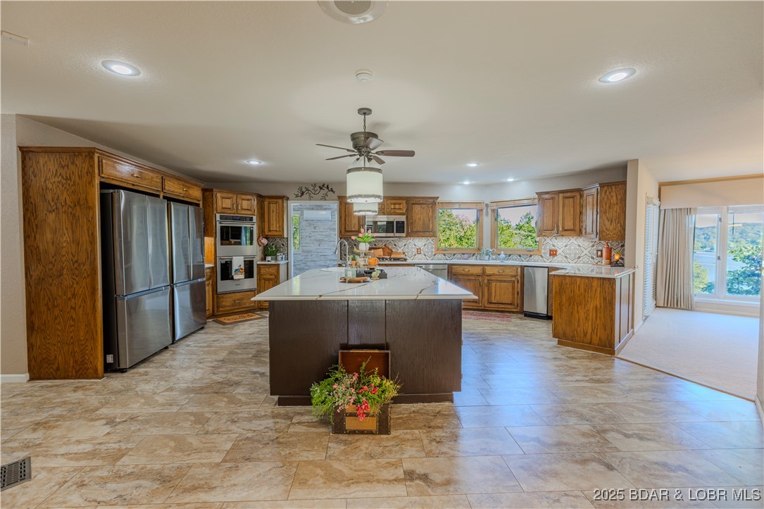 270 Country Club Shores Road Camdenton, MO 65020 - Photo 6 of 26 Kitchen designed for large gatherings.