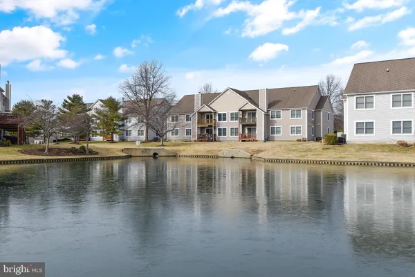 a view of a lake with houses