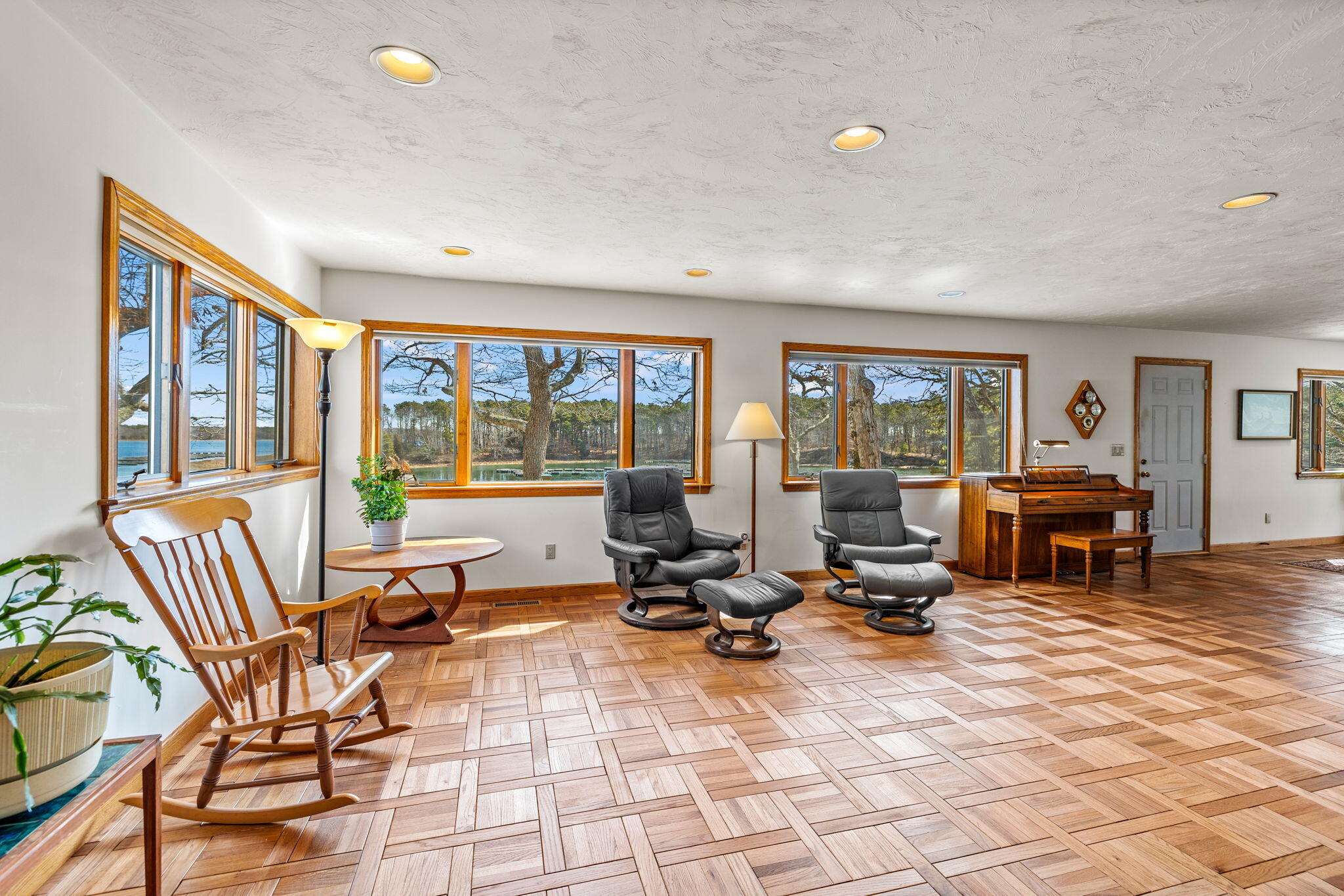 10 Circle Road East Falmouth, MA 02536 - Photo 12 of 65 a view of a livingroom with lounge chair and a large window