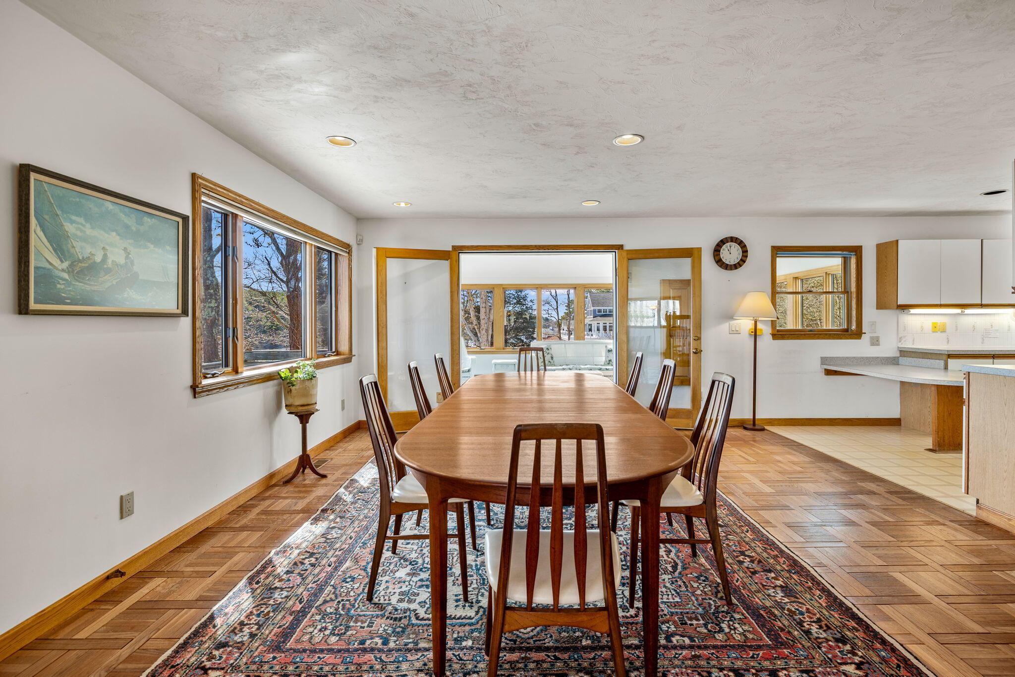 10 Circle Road East Falmouth, MA 02536 - Photo 17 of 65 a view of a dining room with furniture window and wooden floor