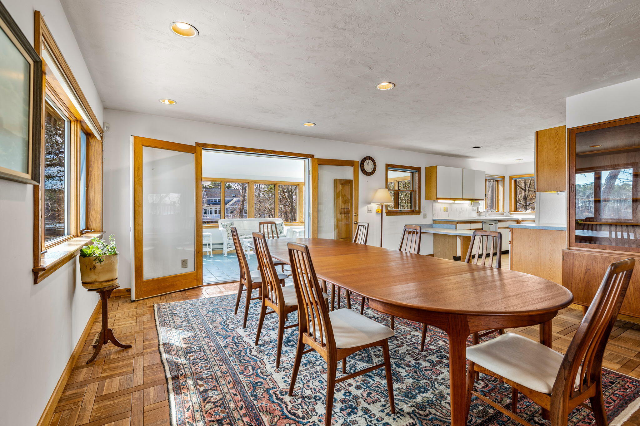 10 Circle Road East Falmouth, MA 02536 - Photo 18 of 65 a view of a dining room with furniture and a potted plant