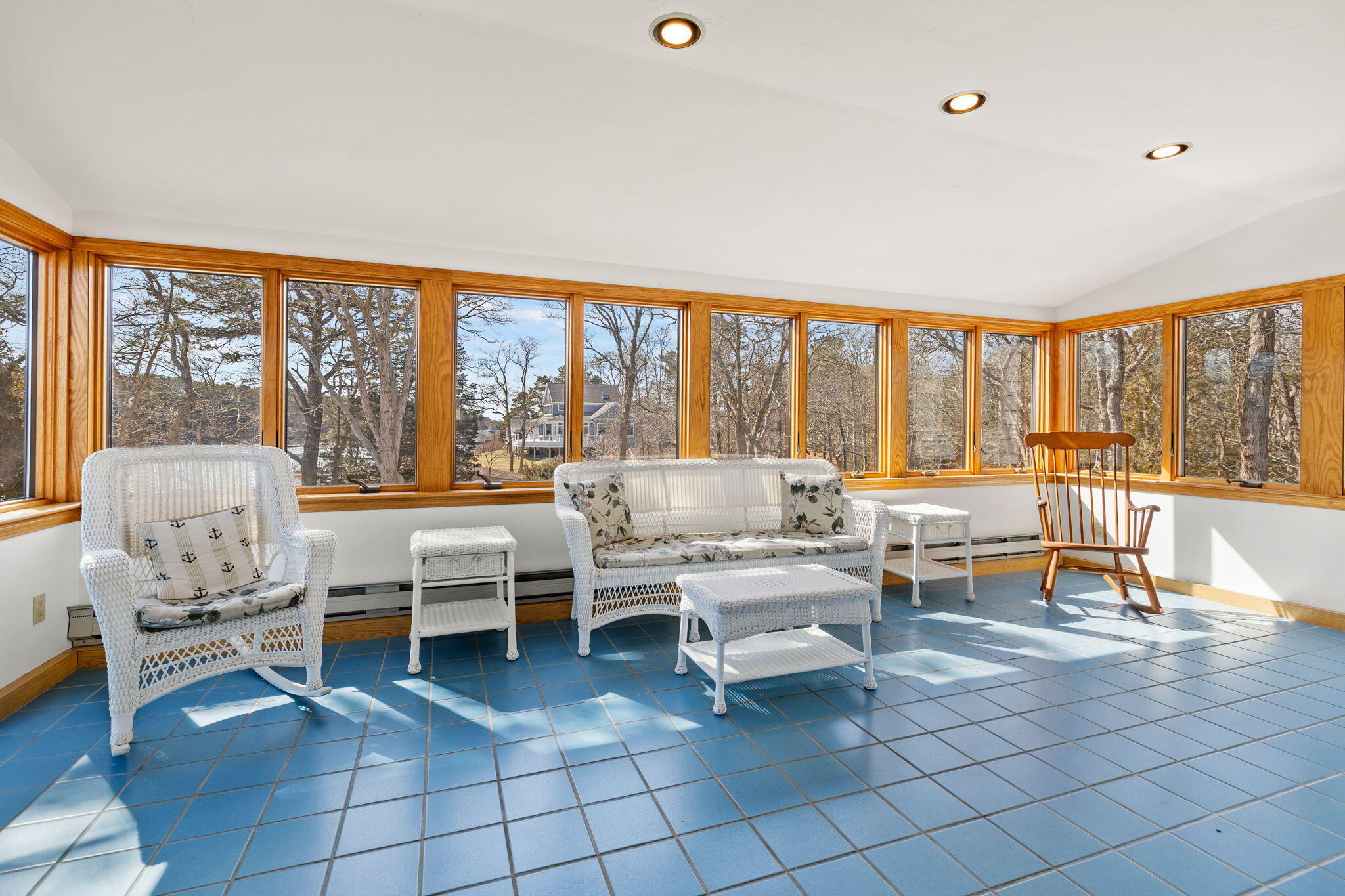 10 Circle Road East Falmouth, MA 02536 - Photo 25 of 65 a living room with furniture a rug and a large window