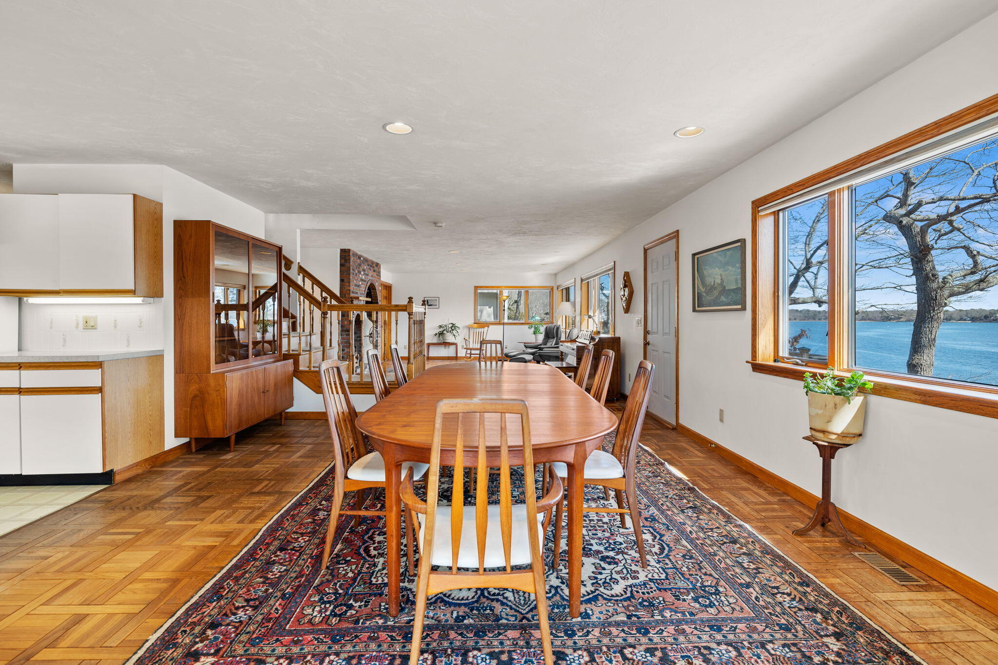 10 Circle Road East Falmouth, MA 02536 - Photo 26 of 65 a dining room with furniture a rug and wooden floor
