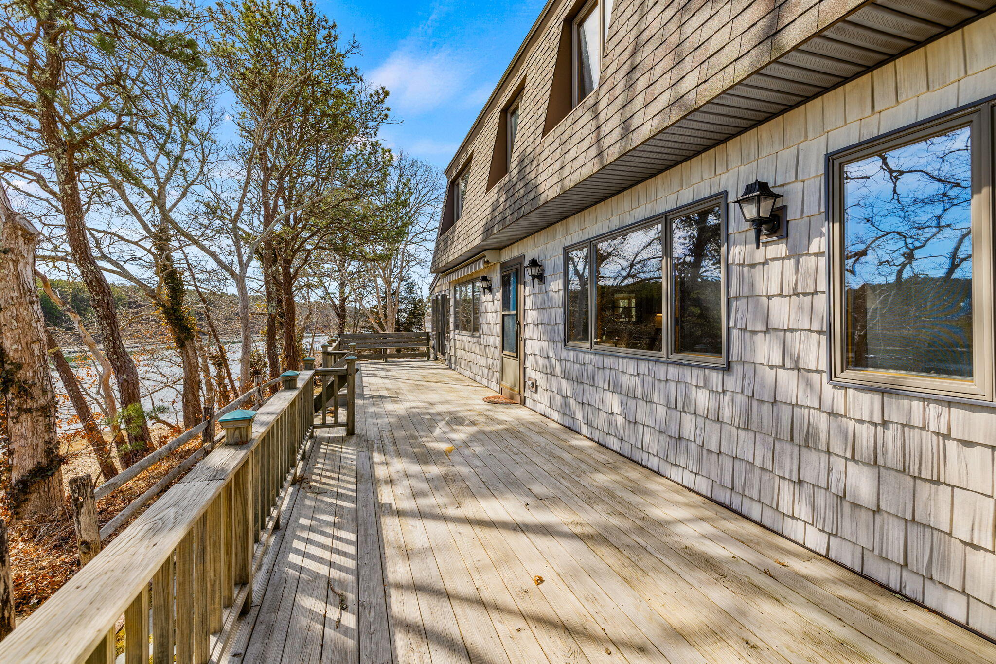 10 Circle Road East Falmouth, MA 02536 - Photo 3 of 65 a view of a pathway with a building in the background