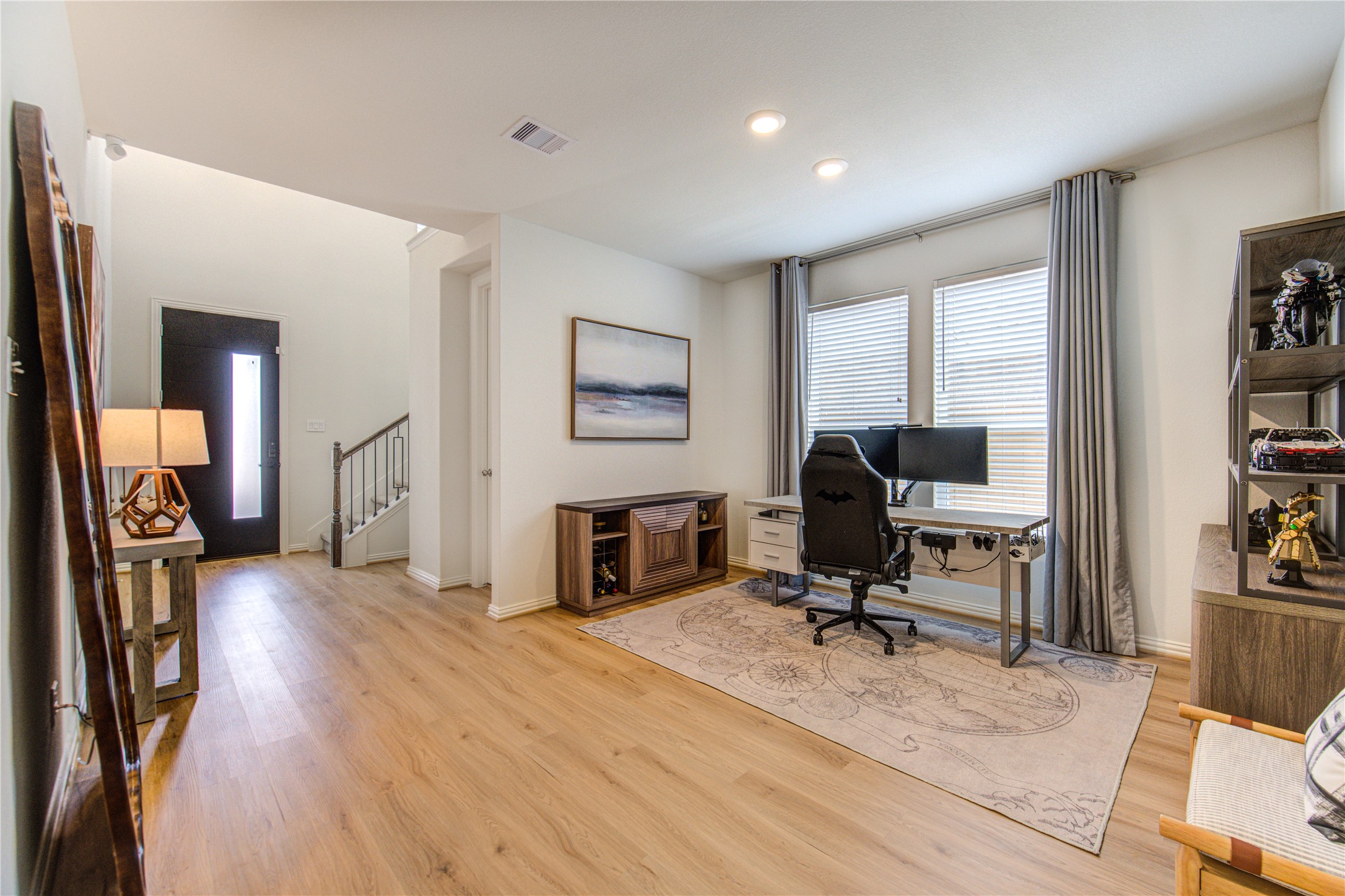 12110 Fletching Stone Lane Houston, TX 77044 - Photo 13 of 50 a view of a workspace with furniture and a window