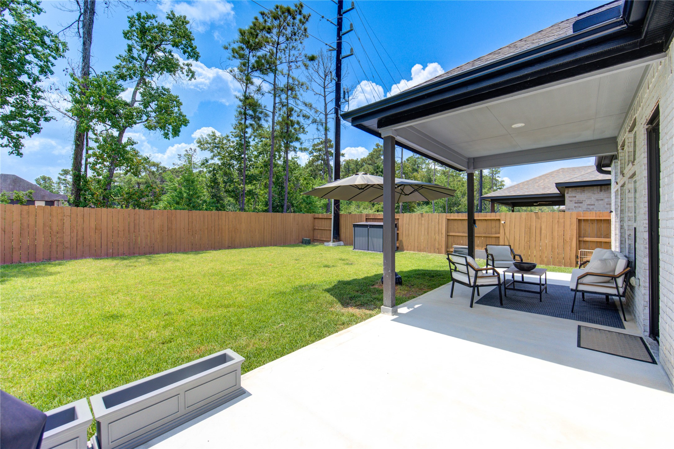 12110 Fletching Stone Lane Houston, TX 77044 - Photo 25 of 50 a view of outdoor space yard deck and outdoor seating