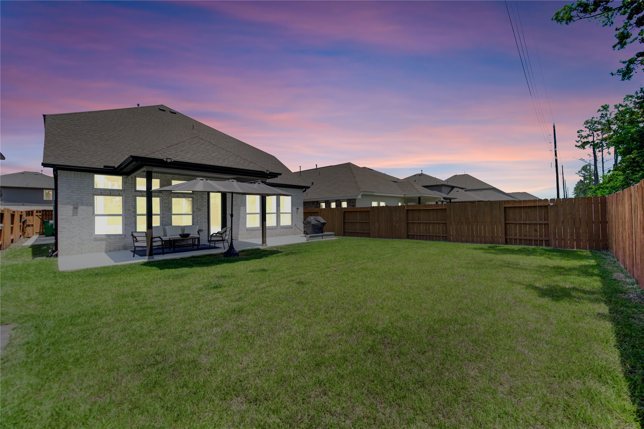 12110 Fletching Stone Lane Houston, TX 77044 - Photo 26 of 50 a front view of a house with garden