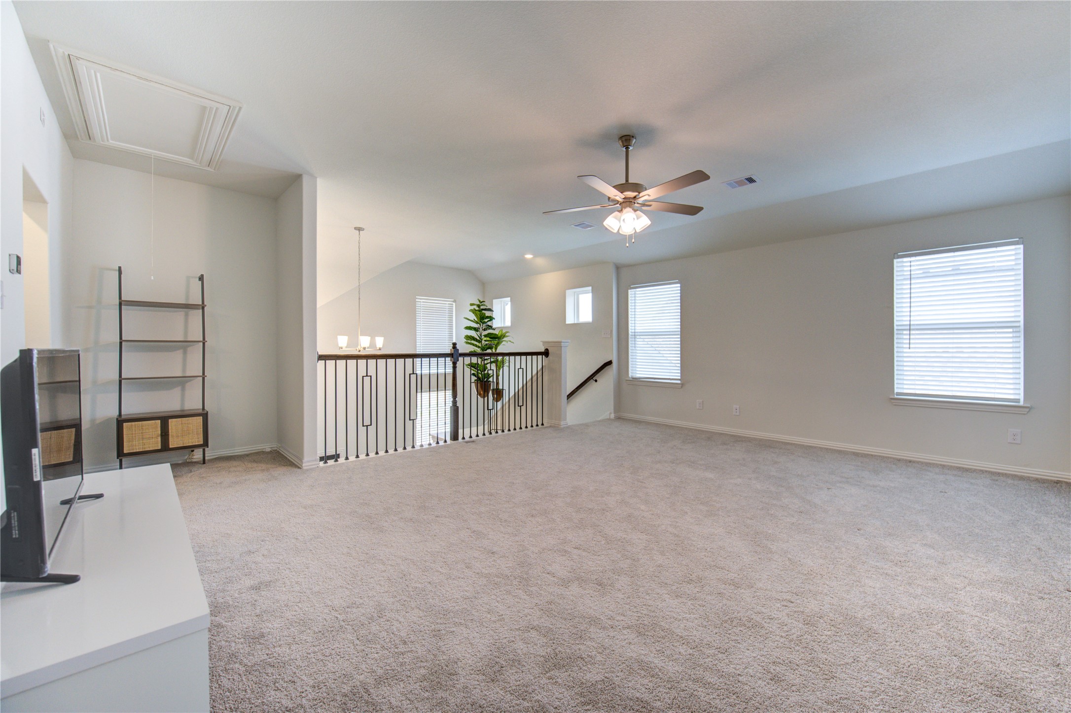 12110 Fletching Stone Lane Houston, TX 77044 - Photo 30 of 50 a view of a livingroom with furniture and a ceiling fan