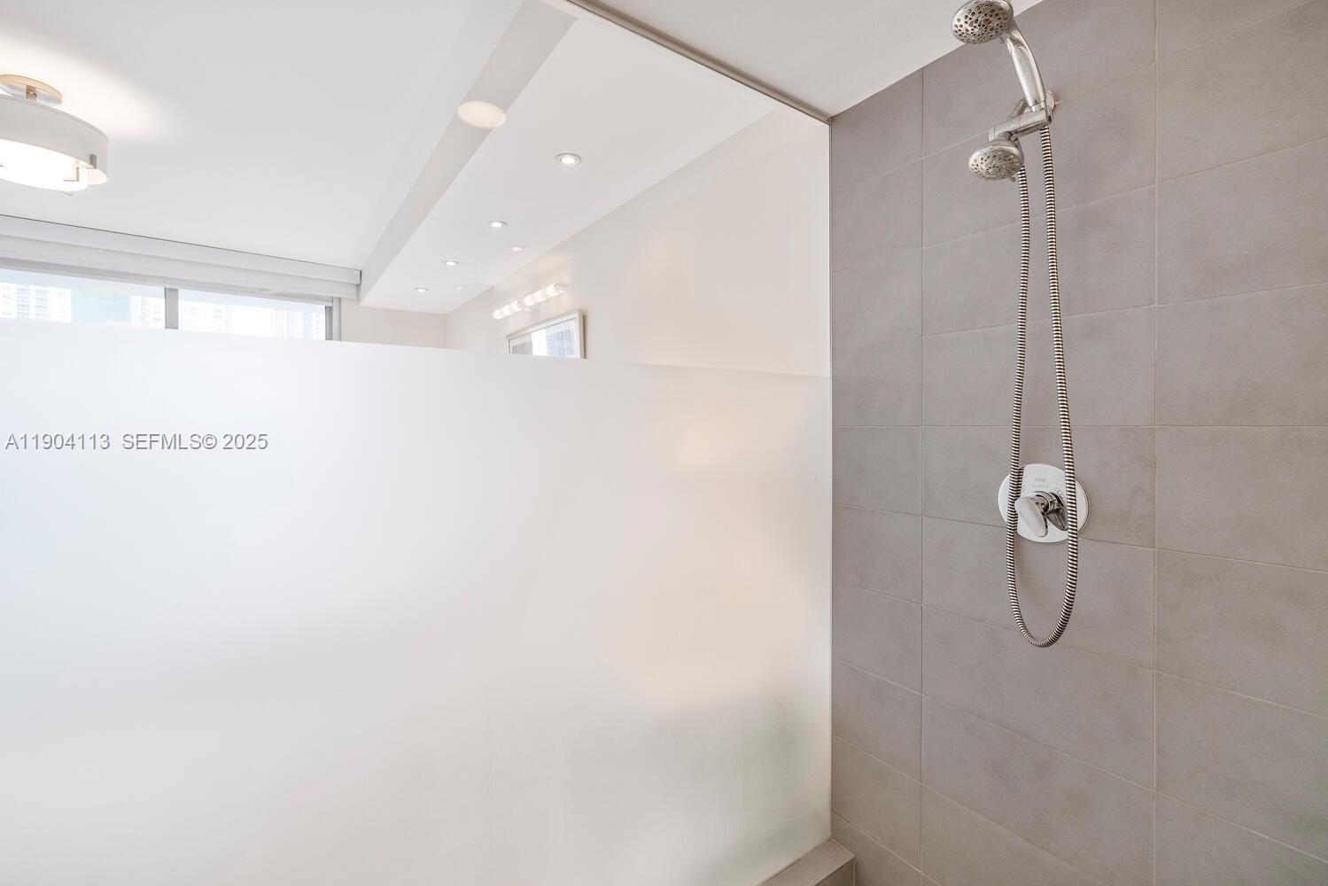 92 Southwest 3rd Street, Unit 310 Miami, FL 33130 - Photo 17 of 40 a bathroom with a shower