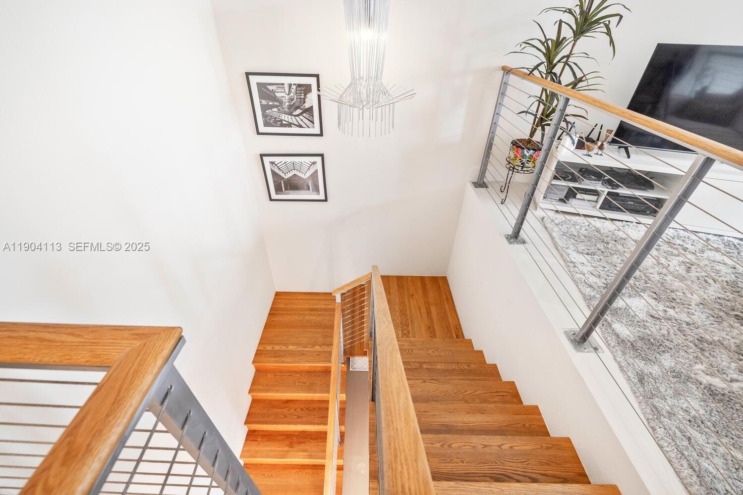 92 Southwest 3rd Street, Unit 310 Miami, FL 33130 - Photo 22 of 40 a view of staircase with a rug