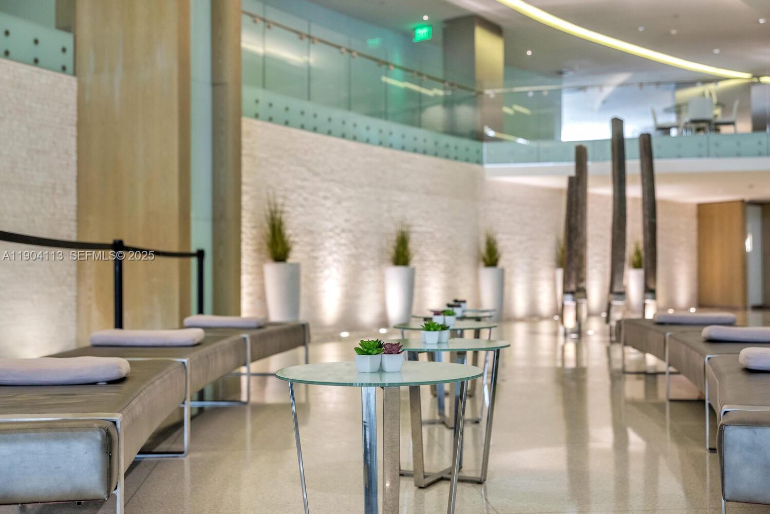 92 Southwest 3rd Street, Unit 310 Miami, FL 33130 - Photo 37 of 40 a dining room with furniture and a large window