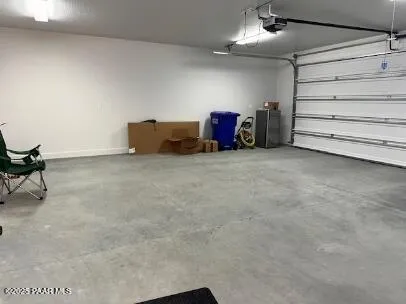 a view of room with furniture and ceiling fan