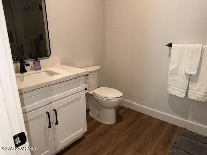 a bathroom with a toilet and a sink