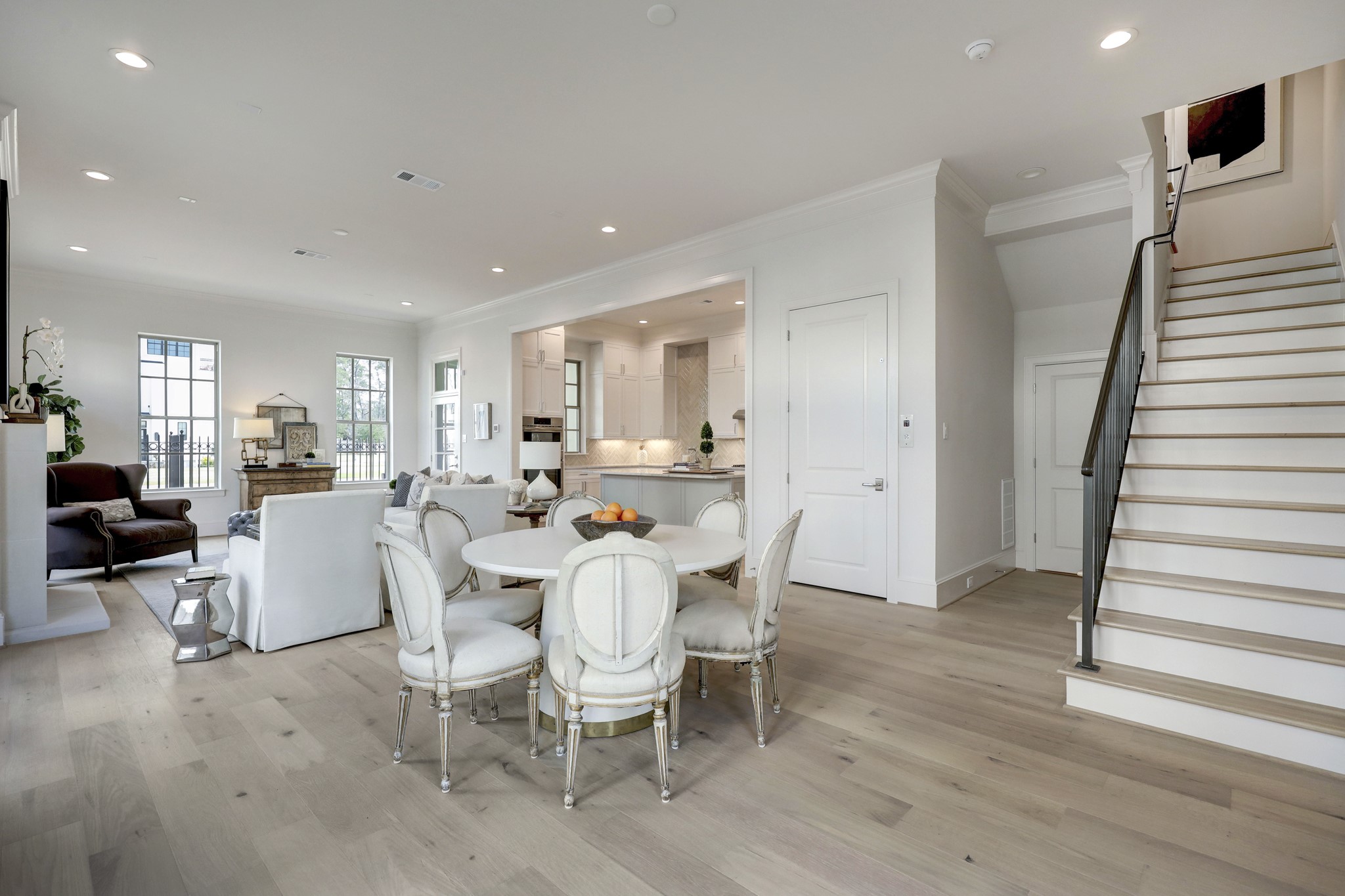 111 Wellington Row Road Houston, TX 77024 - Photo 4 of 19 a view of a dining room with furniture and wooden floor