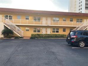 a view of a car in front of a house