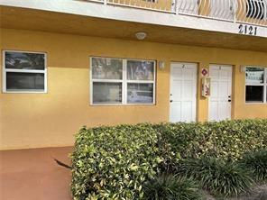 2121 North Ocean Boulevard, Unit 3 Fort Lauderdale, FL 33305 - Photo 2 of 12 a view of a house with backyard