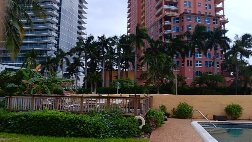 2121 North Ocean Boulevard, Unit 3 Fort Lauderdale, FL 33305 - Photo 7 of 12 a view of a yard in front of a building