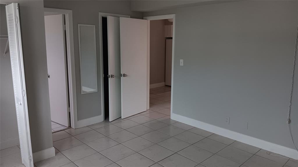2121 North Ocean Boulevard, Unit 3 Fort Lauderdale, FL 33305 - Photo 9 of 12 a view of an empty room