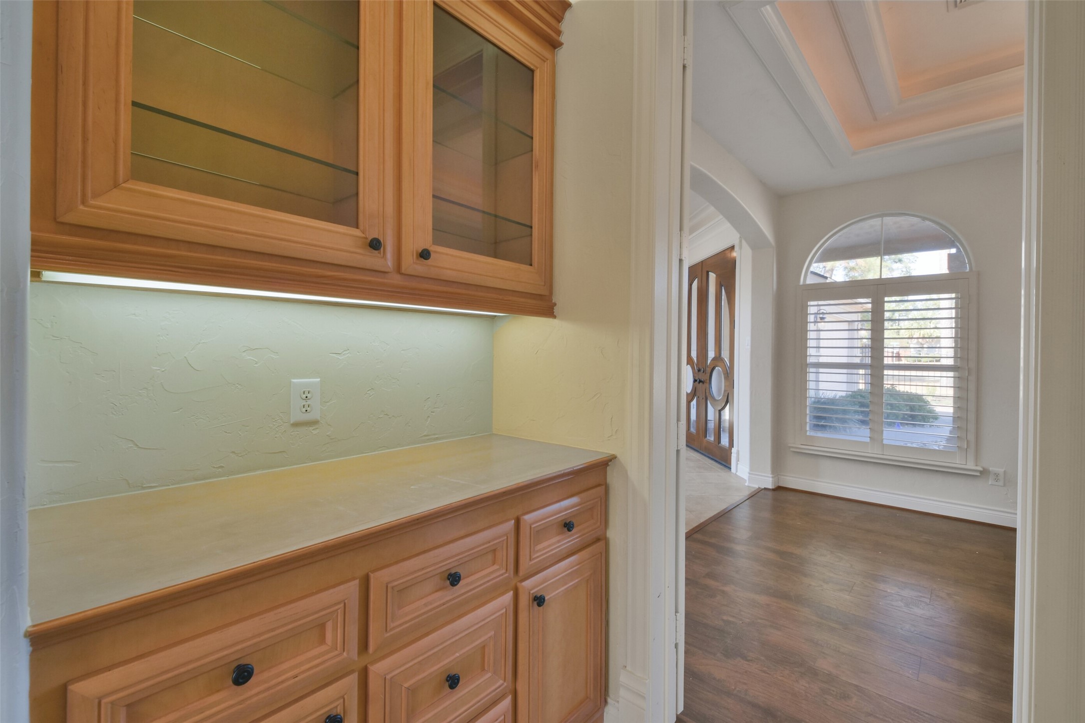 8114 Hideaway Lake Circle Spring, TX 77389 - Photo 14 of 50 a view of a kitchen with wooden floor and cabinets