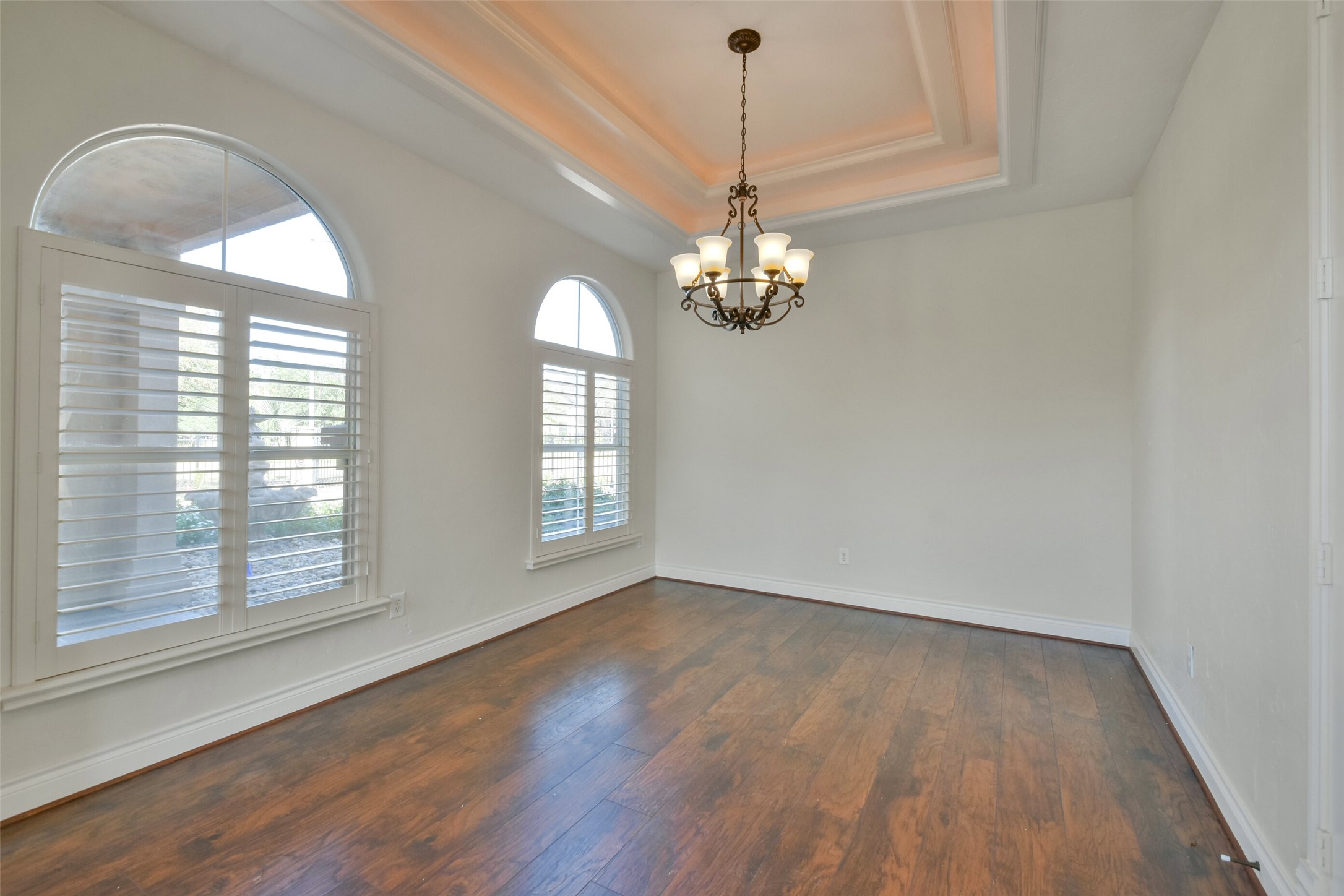 8114 Hideaway Lake Circle Spring, TX 77389 - Photo 15 of 50 a view of empty room with wooden floor and fan