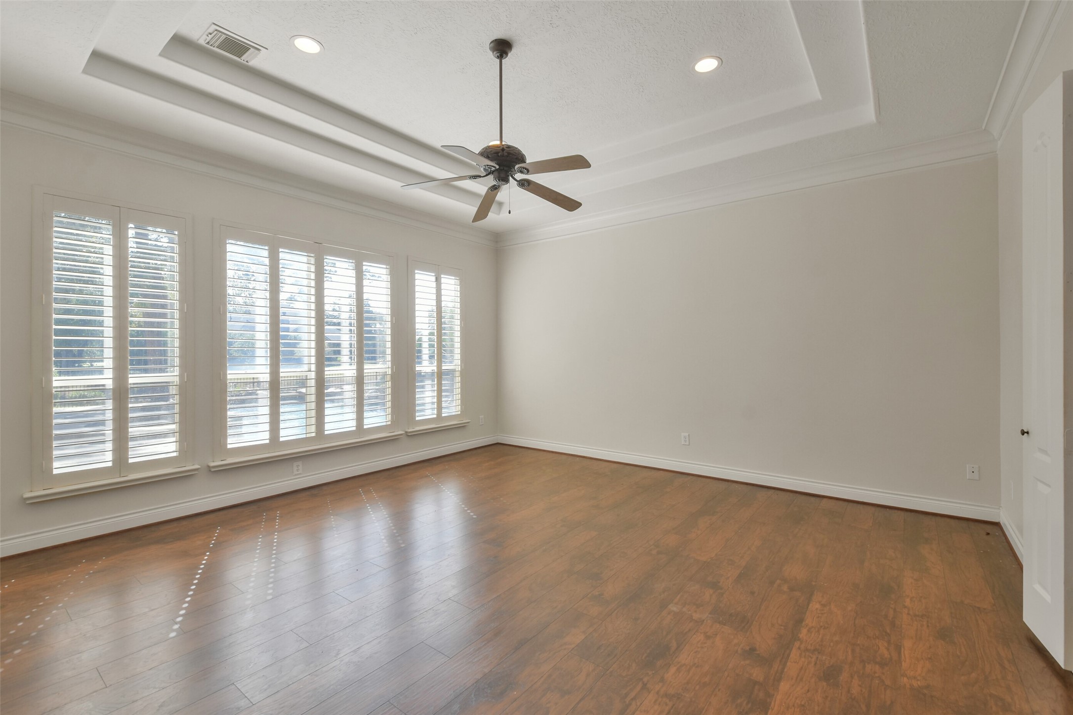 8114 Hideaway Lake Circle Spring, TX 77389 - Photo 20 of 50 a view of empty room with wooden floor and fan