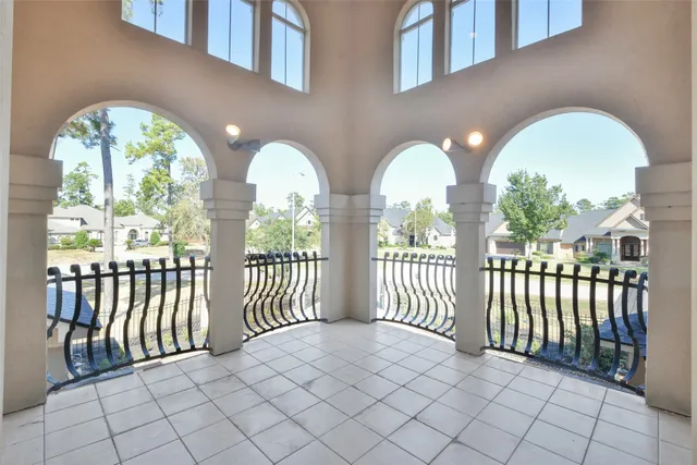 a swimming pool with outdoor seating yard and barbeque oven