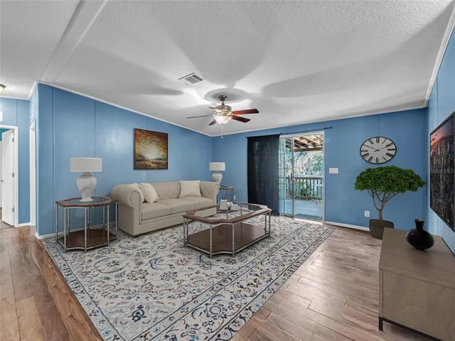 a large kitchen with white cabinets