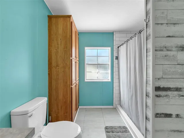 a view of porch with wooden floor