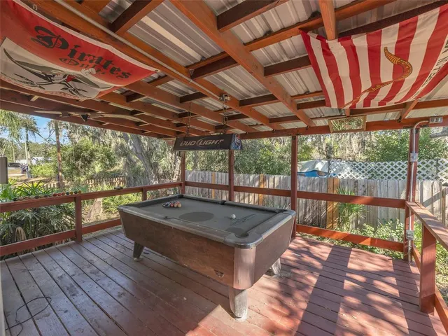 a view of a swimming pool with a patio