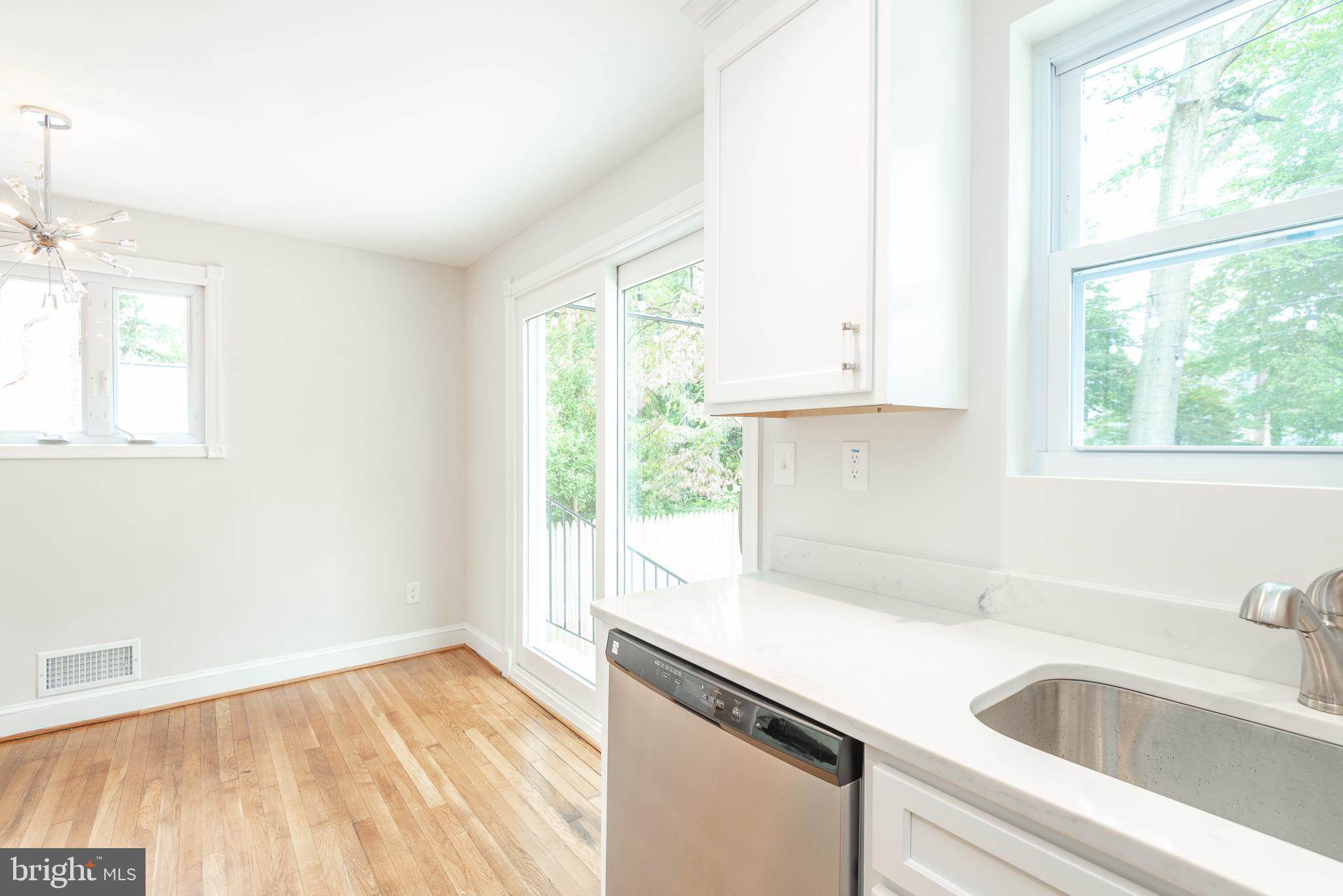 9113 Walden Road Silver Spring, MD 20901 - Photo 13 of 39 Kitchen with view toward Pella Slider