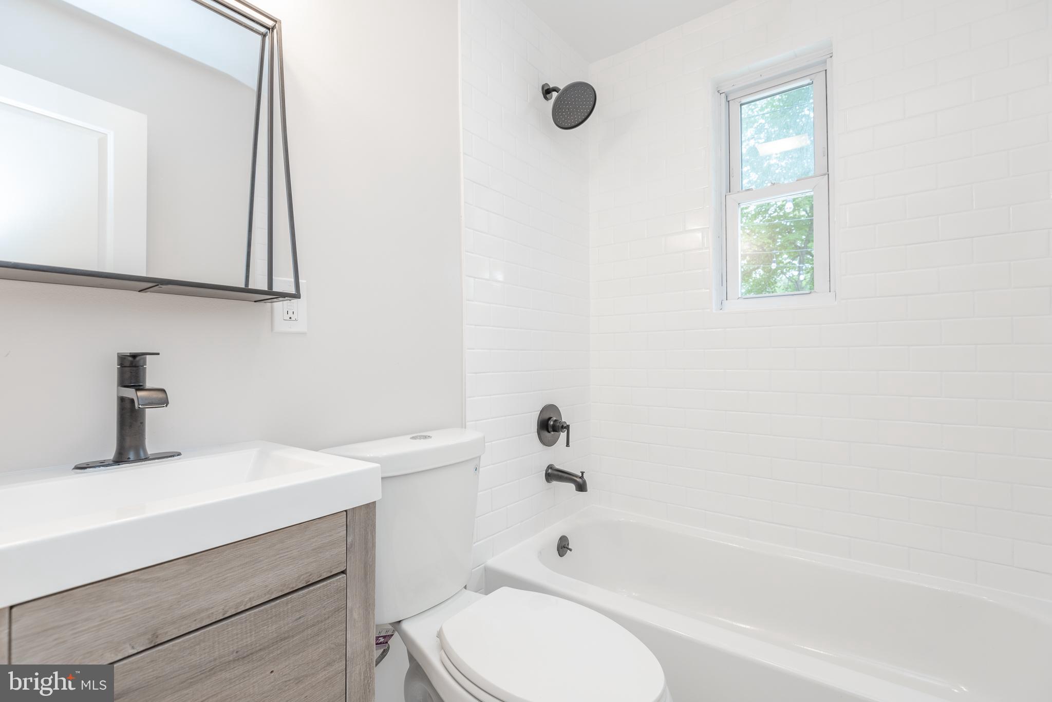 9113 Walden Road Silver Spring, MD 20901 - Photo 17 of 39 Main Floor Hall Full Bath