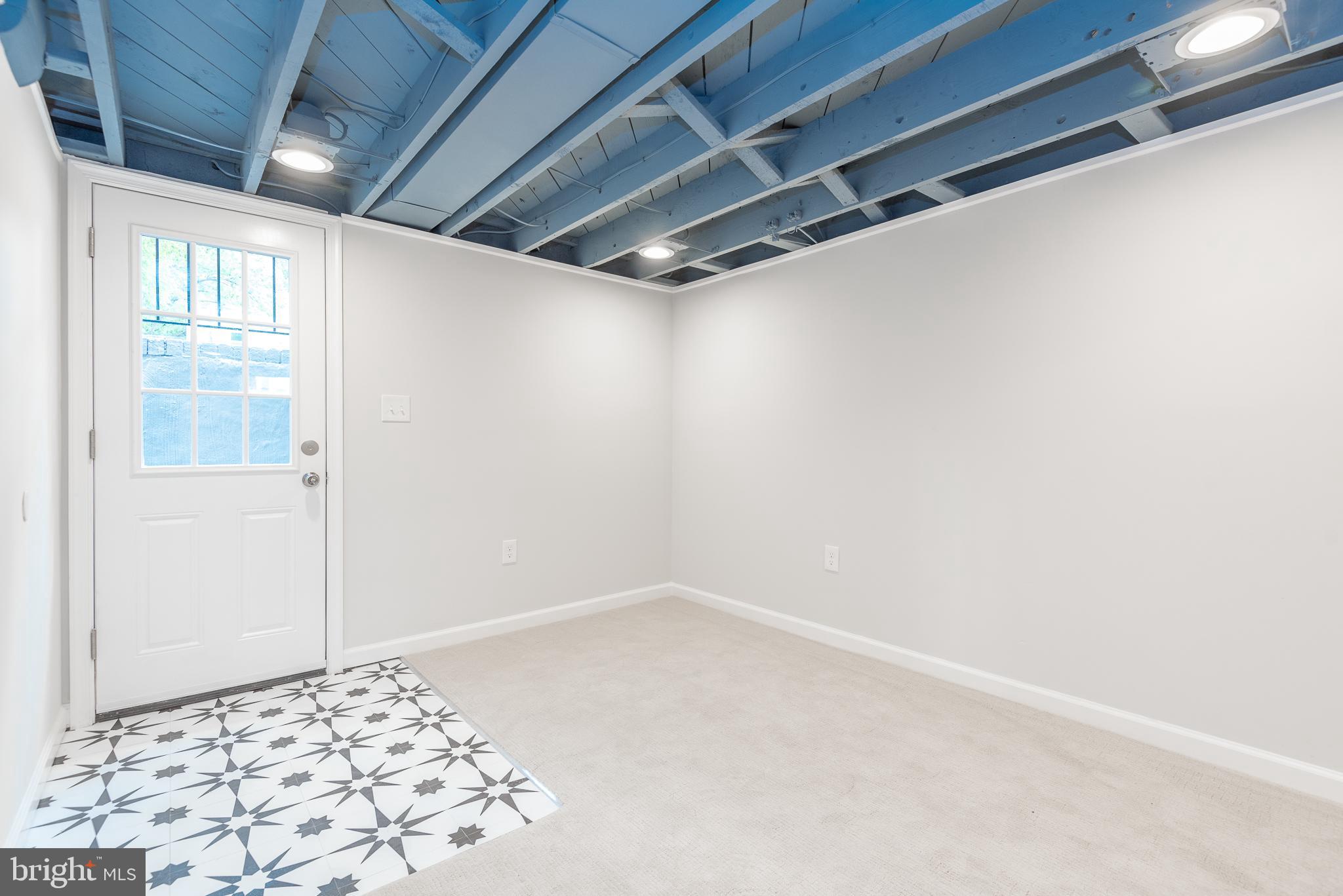 9113 Walden Road Silver Spring, MD 20901 - Photo 33 of 39 Lower Exit, Exercise Area, Reading Nook