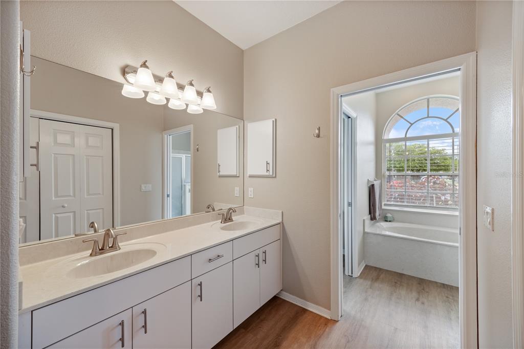 8131 Baytree Drive New Port Richey, FL 34653 - Photo 10 of 35 Primary bath with dual sinks