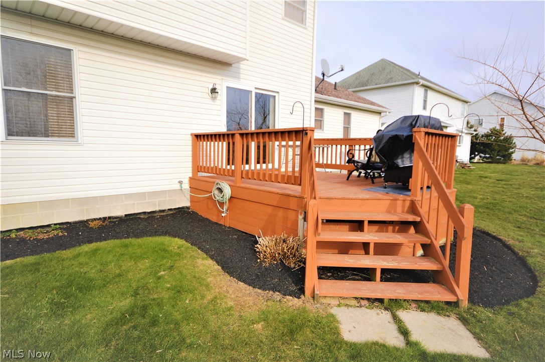4112 Logans Way Perry, OH 44081 - Photo 29 of 29 Back deck with mulched bed surrounding