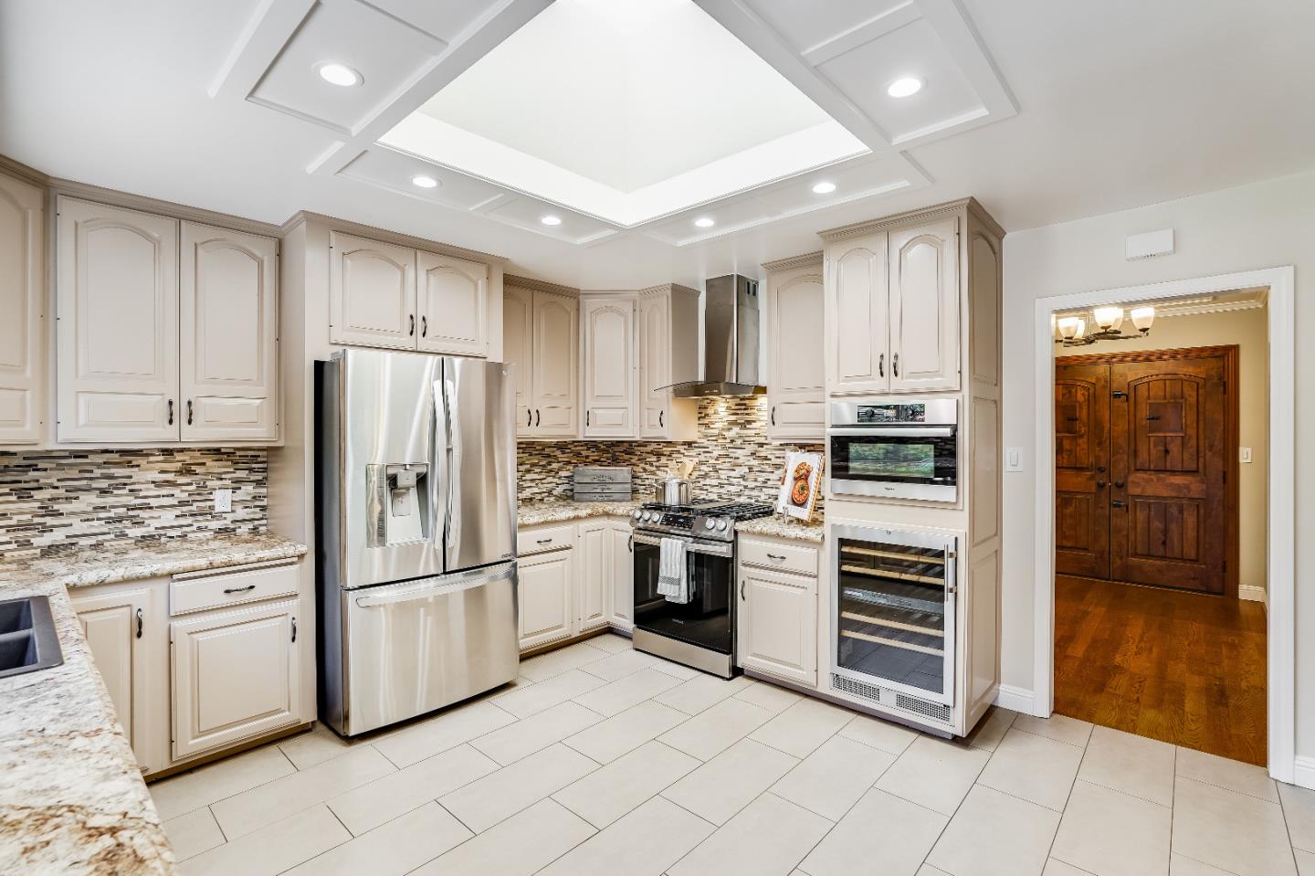 2275 Grant Road Los Altos, CA 94024 - Photo 24 of 66 a kitchen with granite countertop cabinets and stainless steel appliances