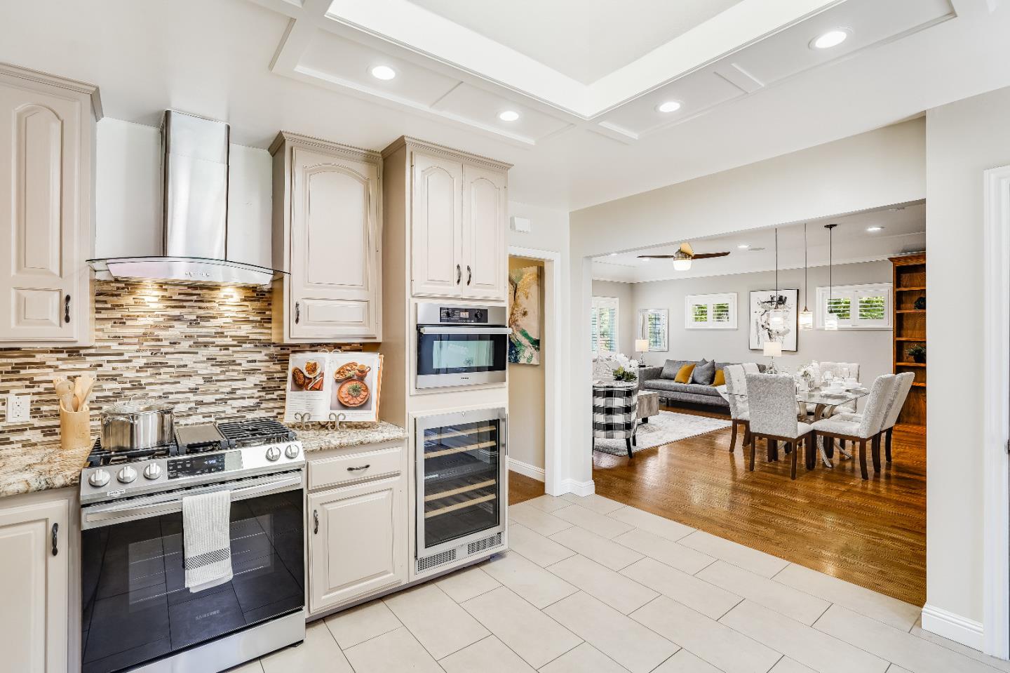 2275 Grant Road Los Altos, CA 94024 - Photo 25 of 66 a kitchen with stainless steel appliances kitchen island granite countertop a stove a sink and a refrigerator