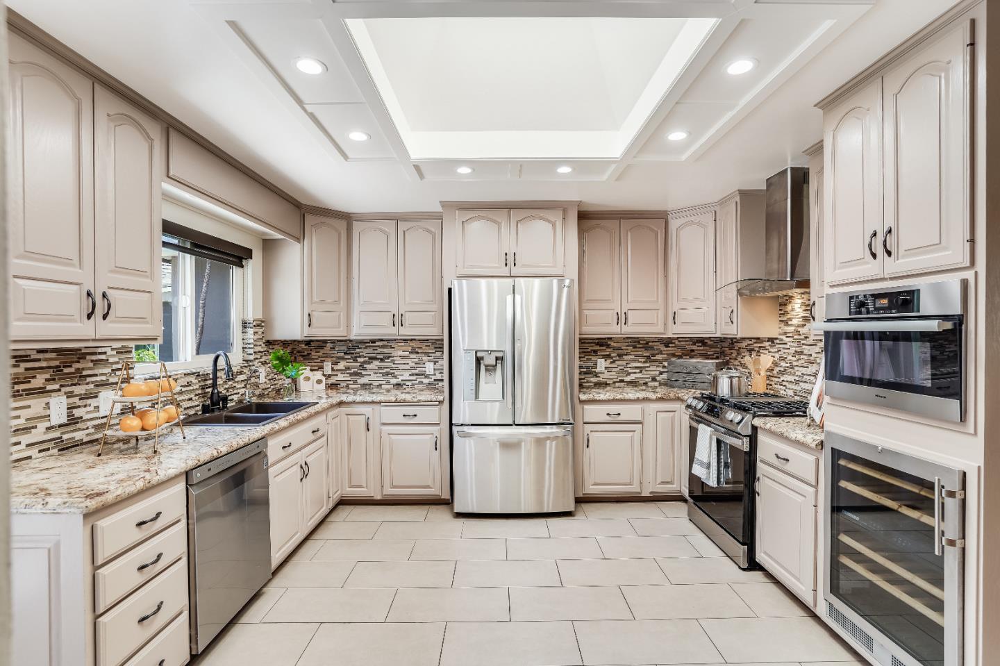 2275 Grant Road Los Altos, CA 94024 - Photo 26 of 66 a kitchen with stainless steel appliances granite countertop a refrigerator sink and stove