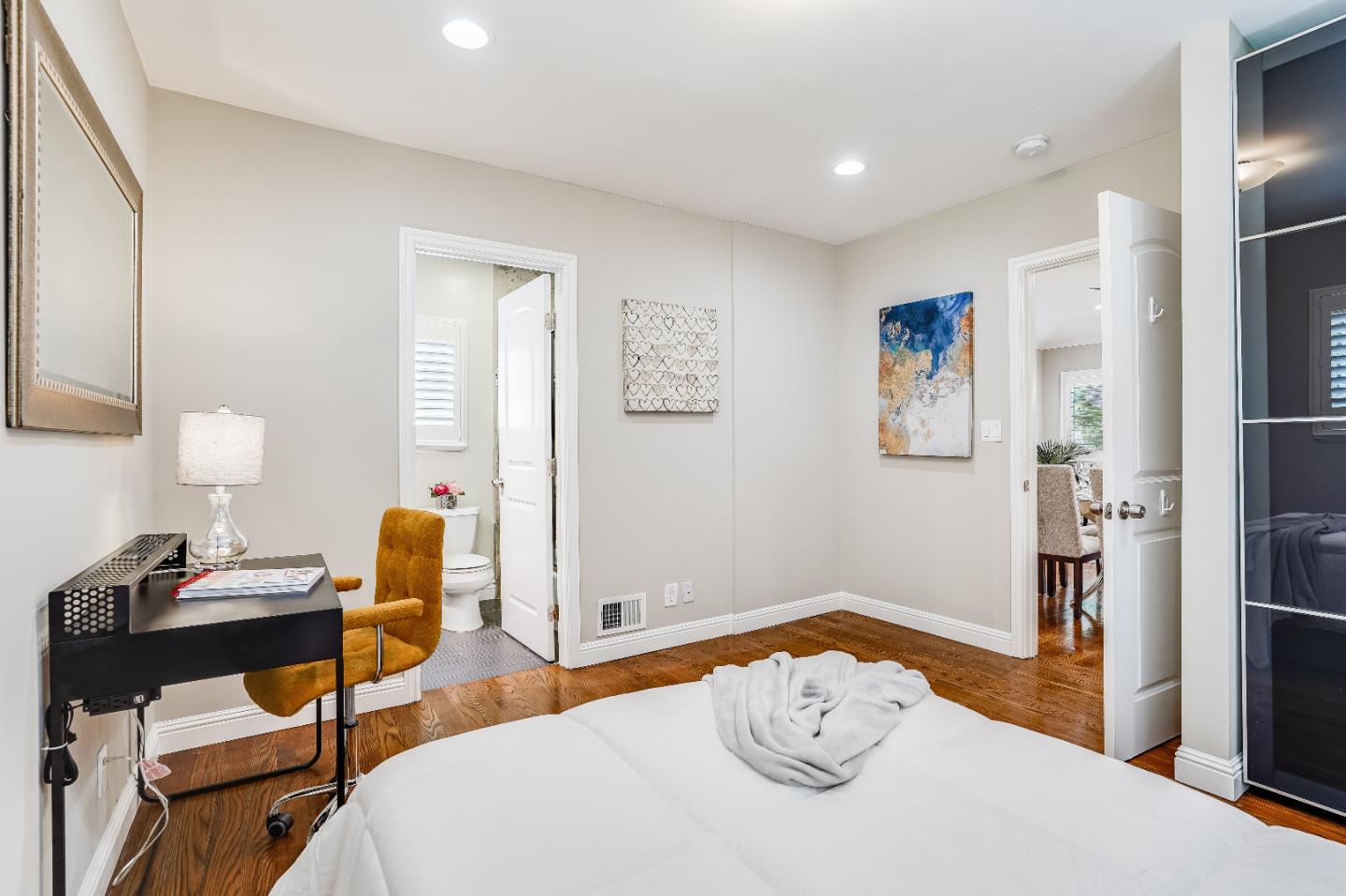 2275 Grant Road Los Altos, CA 94024 - Photo 37 of 66 a bedroom with a bed and a table in it