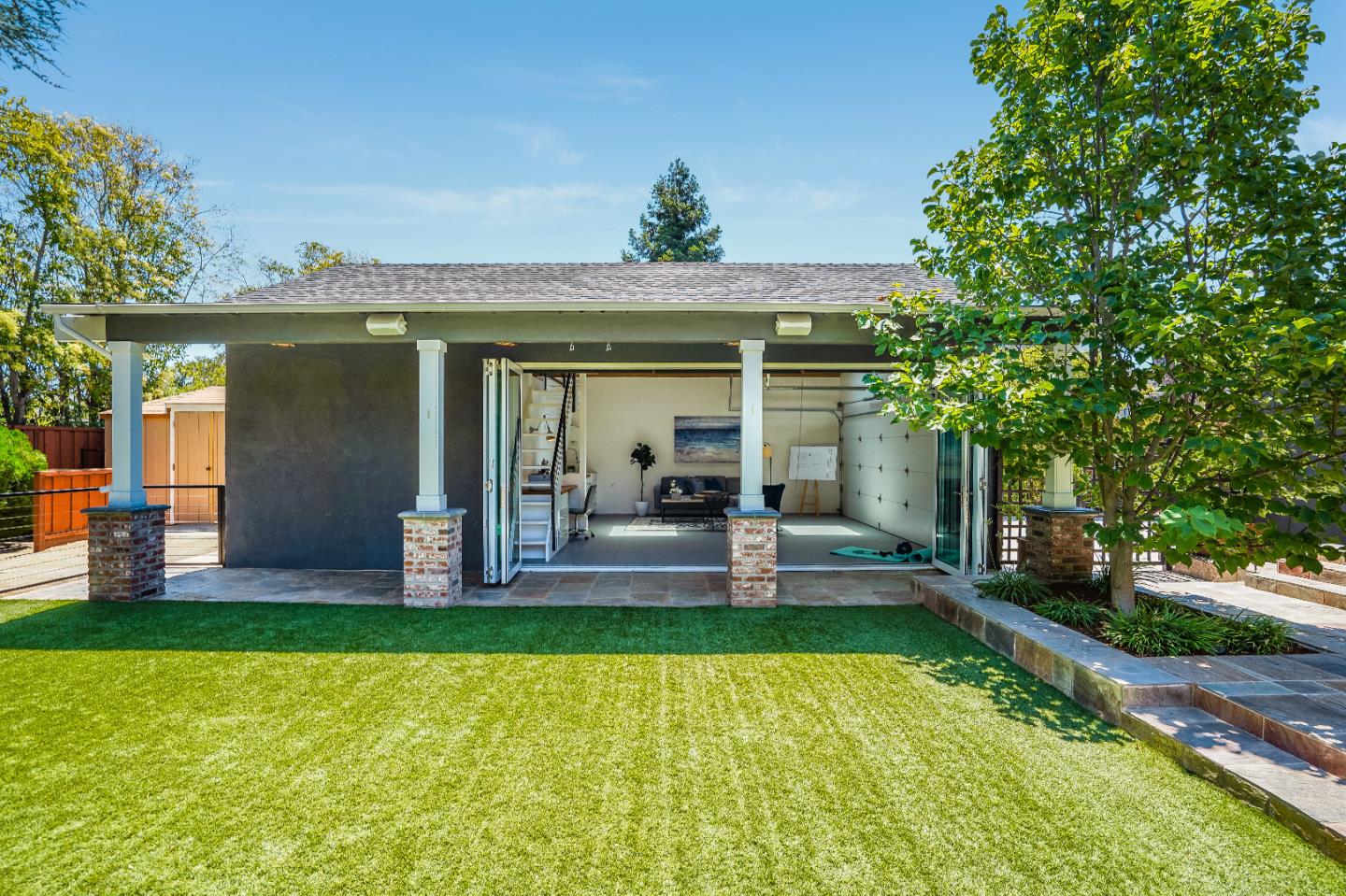2275 Grant Road Los Altos, CA 94024 - Photo 49 of 66 a view of a house with a yard porch and a patio