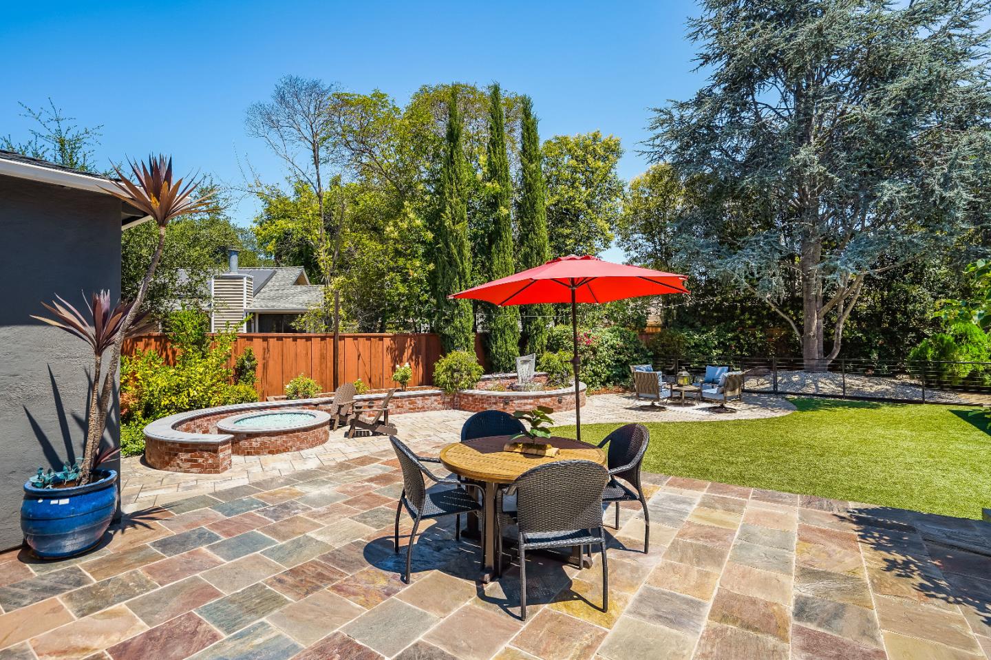 2275 Grant Road Los Altos, CA 94024 - Photo 58 of 66 a view of a swimming pool with a table and chairs