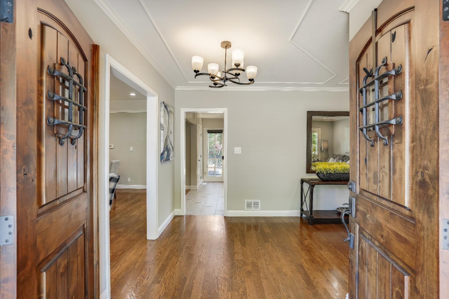 2275 Grant Road Los Altos, CA 94024 - Photo 8 of 66 a view of a hallway with wooden floor and staircase