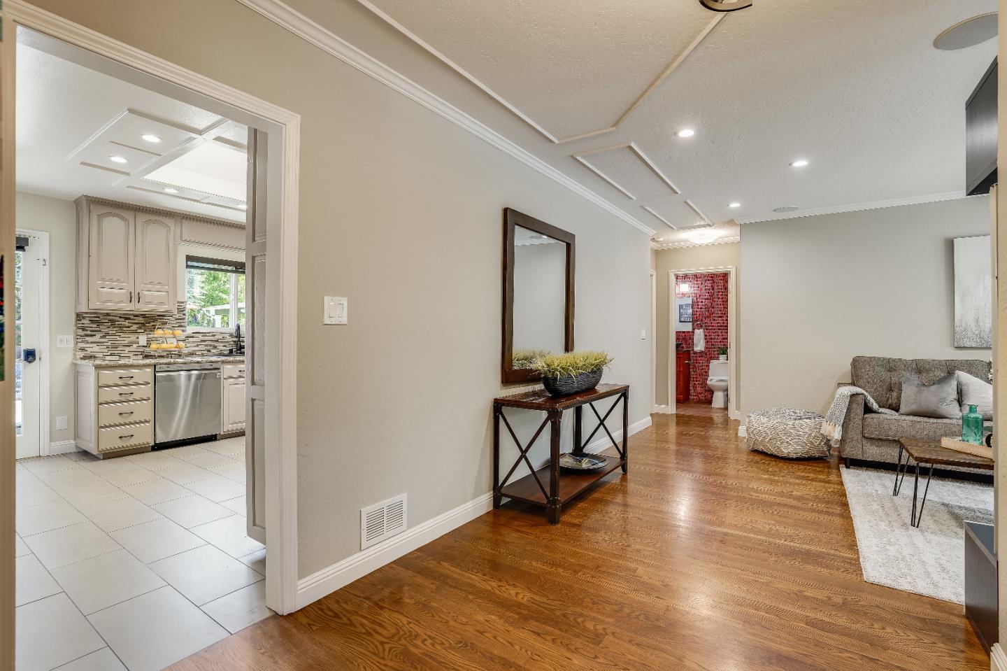 2275 Grant Road Los Altos, CA 94024 - Photo 9 of 66 a living room with furniture and a kitchen view