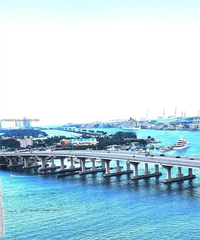 a view of an ocean with city