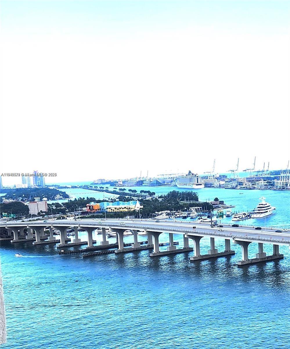 555 Northeast 15th Street, Unit 23J Miami, FL 33132 - Photo 11 of 20 a view of a lake with tall building