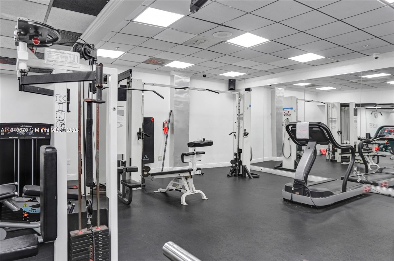 555 Northeast 15th Street, Unit 23J Miami, FL 33132 - Photo 15 of 20 a view of a room with gym equipment